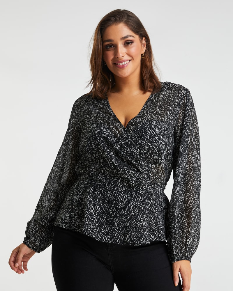Front of a model wearing a size 1X Sweet Spot Top in Black/Milk by Estelle. | dia_product_style_image_id:264264